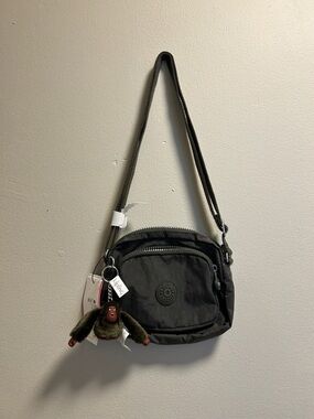 Kipling Charcoal Gray Crossbody Bag with Monkey Charm